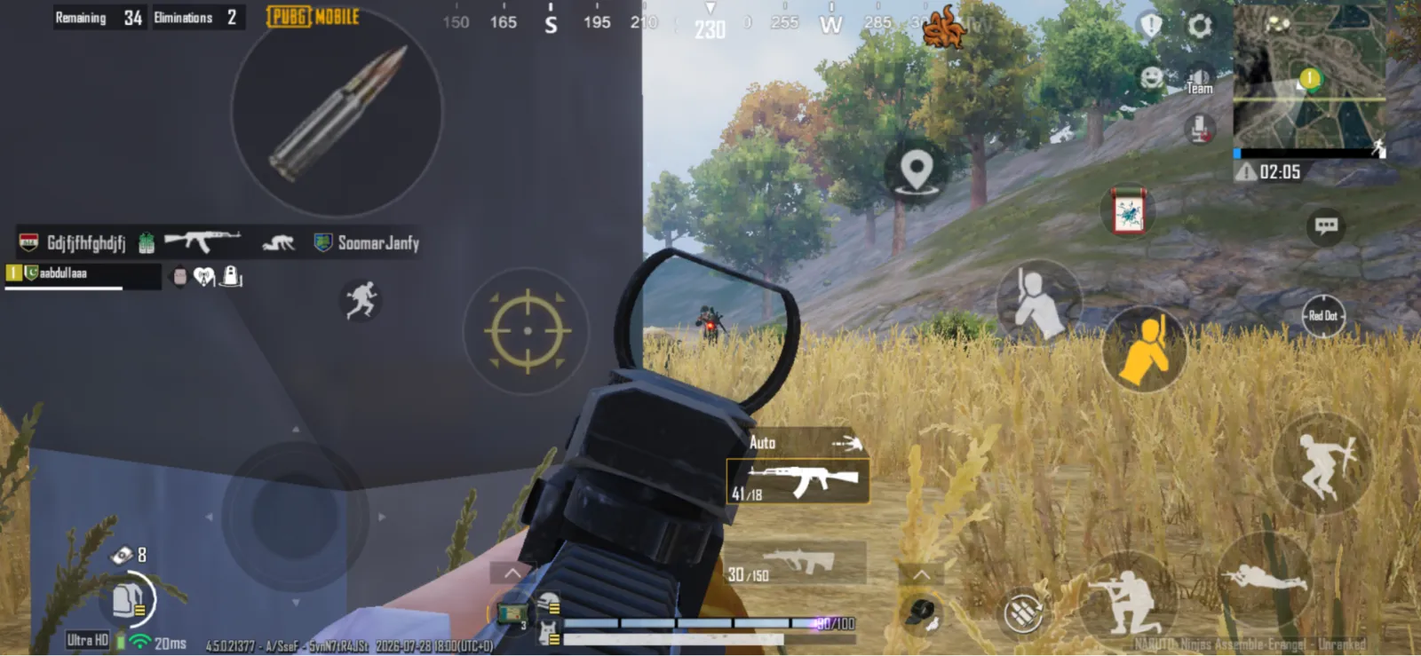 Aiming down a red-dot sight in PUBG Mobile, with the ammo counter and weapon loadout shown on screen